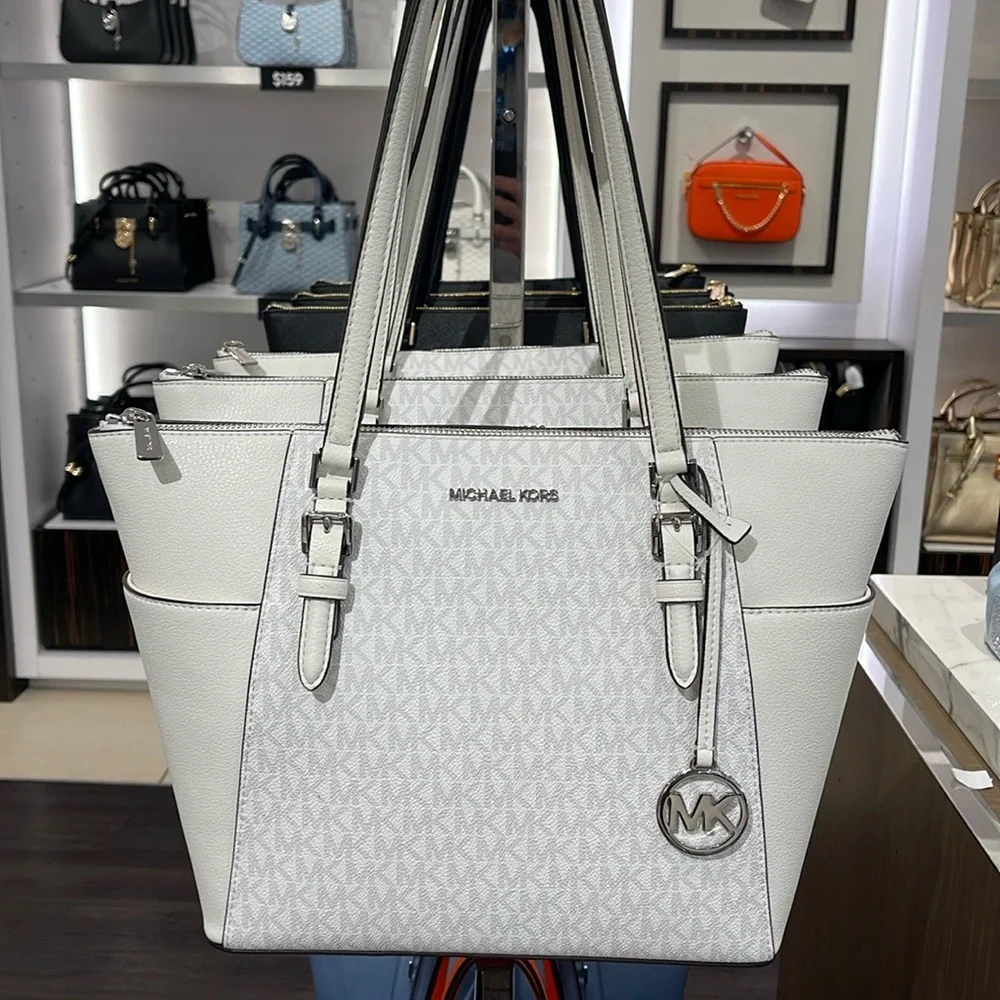 Michael Kors Charlotte Large Logo and Leather Top-Zip Tote Bag
Optic White
NWT - Picture 16 of 16